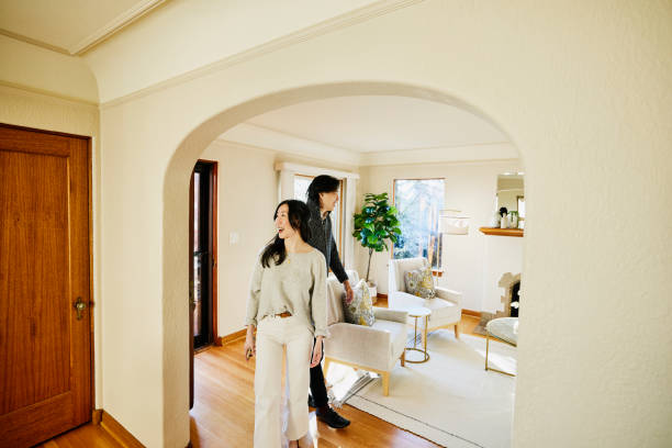 Couple walking into their new home